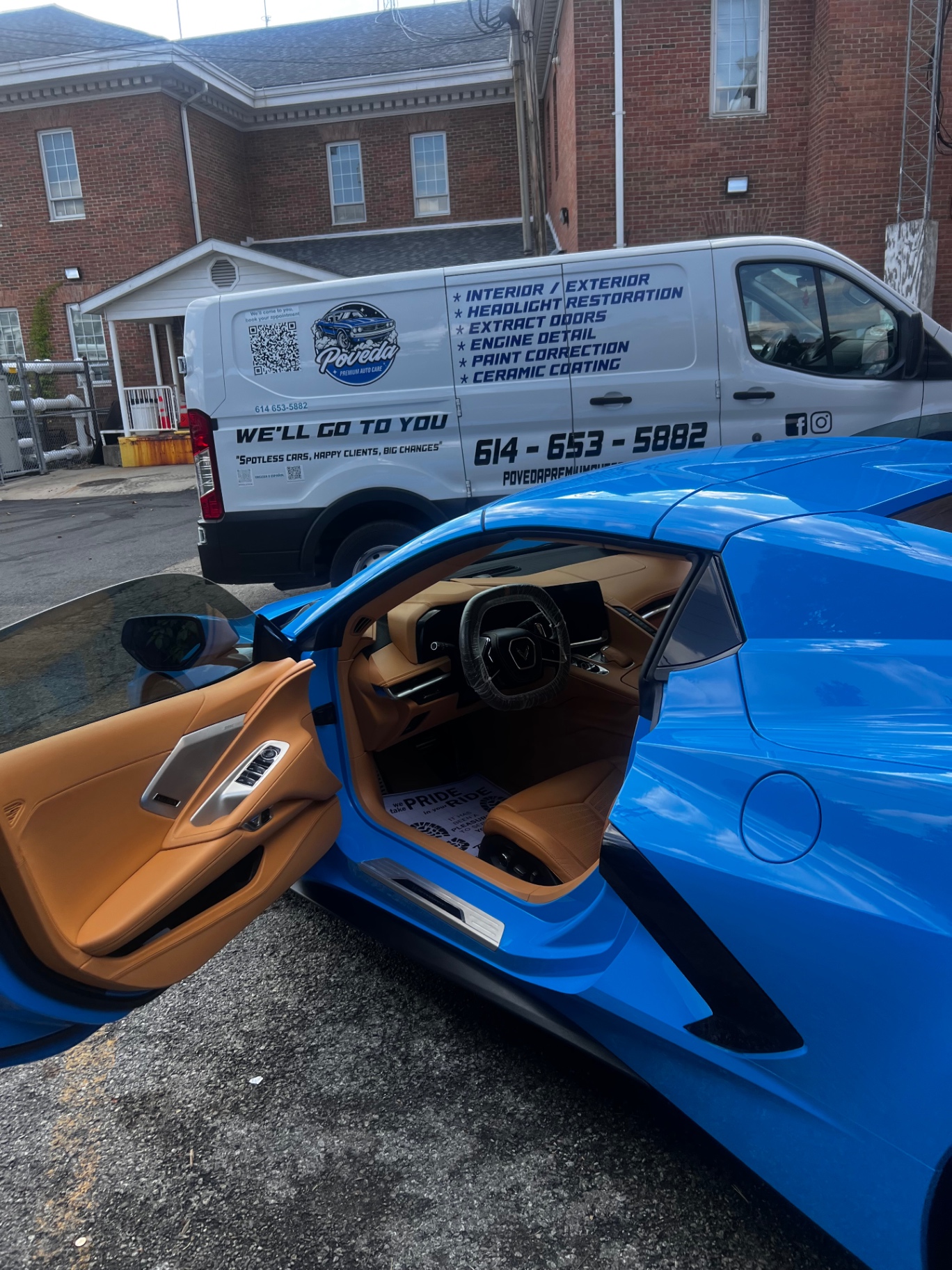 Blue Corvette detailed beside the Poveda mobile detailing van in Columbus, Ohio