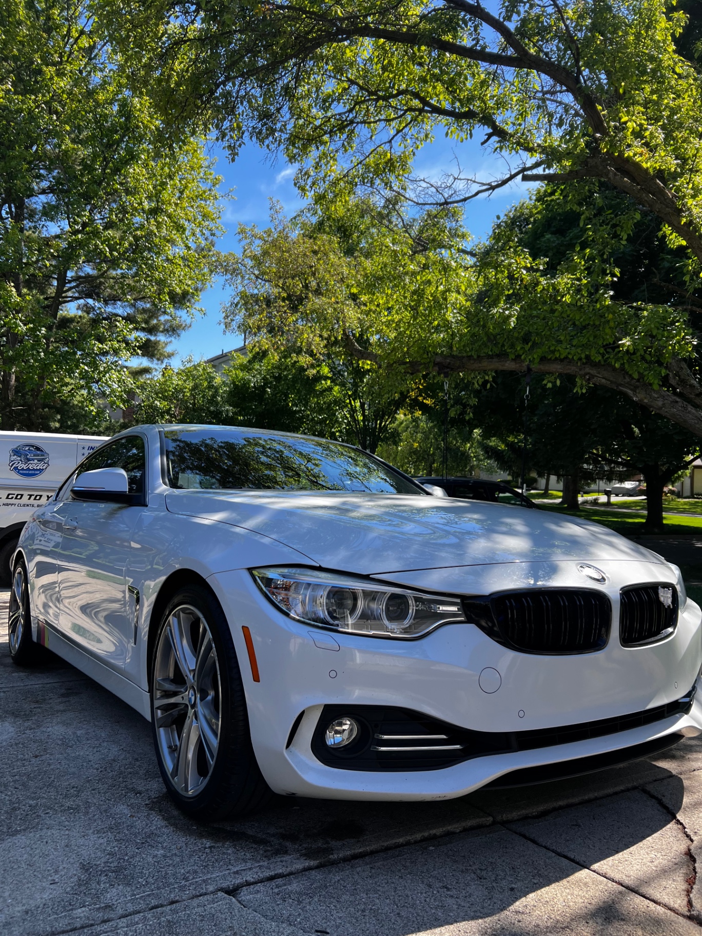 White BMW after exterior detailing by Poveda